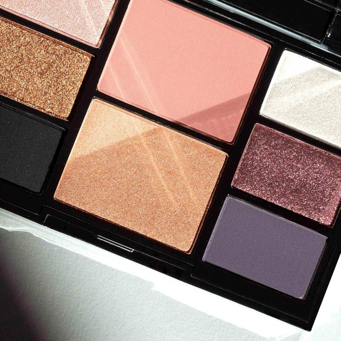 Lune+Aster Double Booked Face & Eye Palette - This online exclusive palette features a mauve blush, bronze highlighter and six show-stopping velvety eyeshadows to create an elevated look for any special occasion.